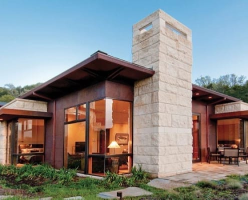 Butt glazed corner wood clad window in modern home