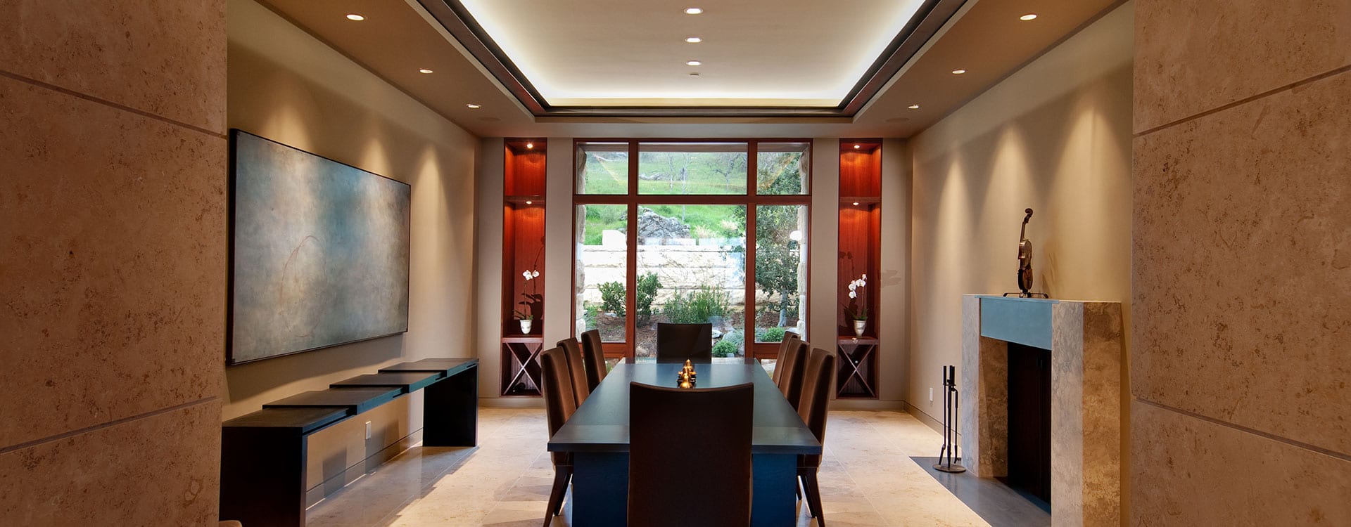 Modern bronze clad windows in dining room of a home on the Santa Lucia Preserve