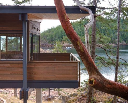 Custom wood doors overlooking water