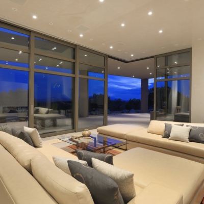 Massive aluminum lift and slide doors that meet in the corner, interior view