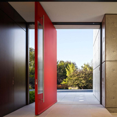 Massive wood pivot modern entryway