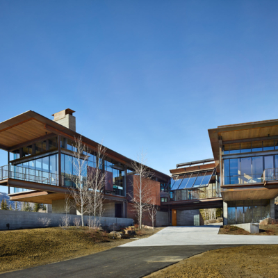 Bigwood residence with steel residential storefront windows and tilting window wall