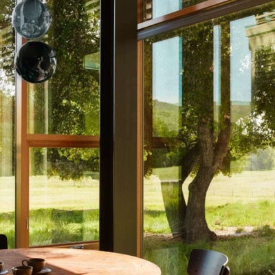 Residential wood storefront windows in a country home