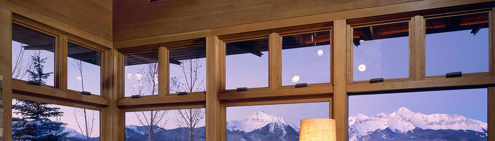 Motorized awning windows