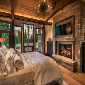 Bedroom with view through custom modern wood windows