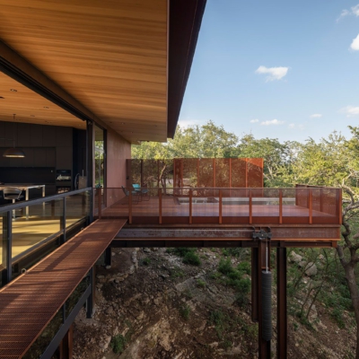 Moving residential window wall in the open position, becoming a railing