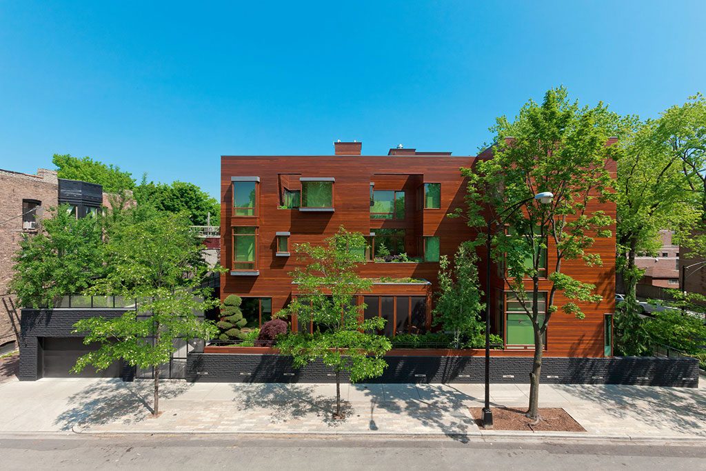 Oz Park home exterior with contemporary wooden windows